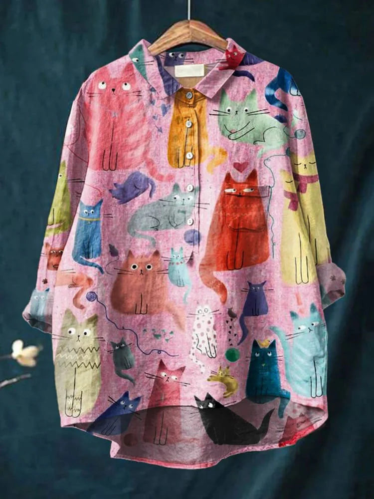 Kattiga Chic – Oversize Blus med Konstnärligt Tryck