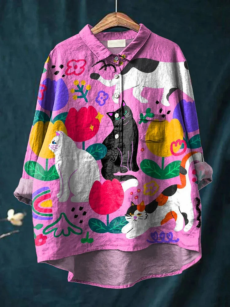 Kattiga Chic – Oversize Blus med Konstnärligt Tryck