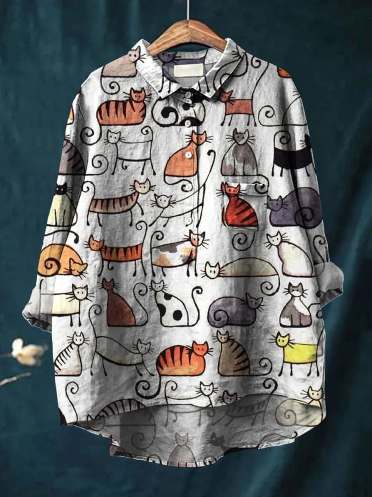 Kattiga Chic – Oversize Blus med Konstnärligt Tryck
