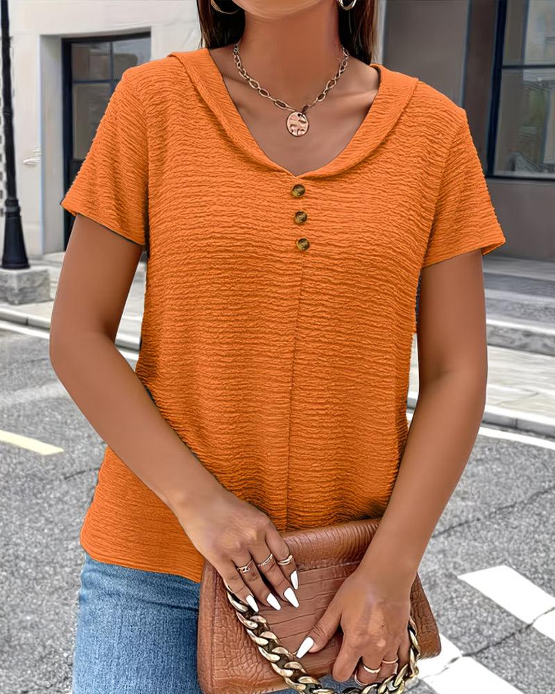 Feminint Top med Elegant Krage och Guldknappar