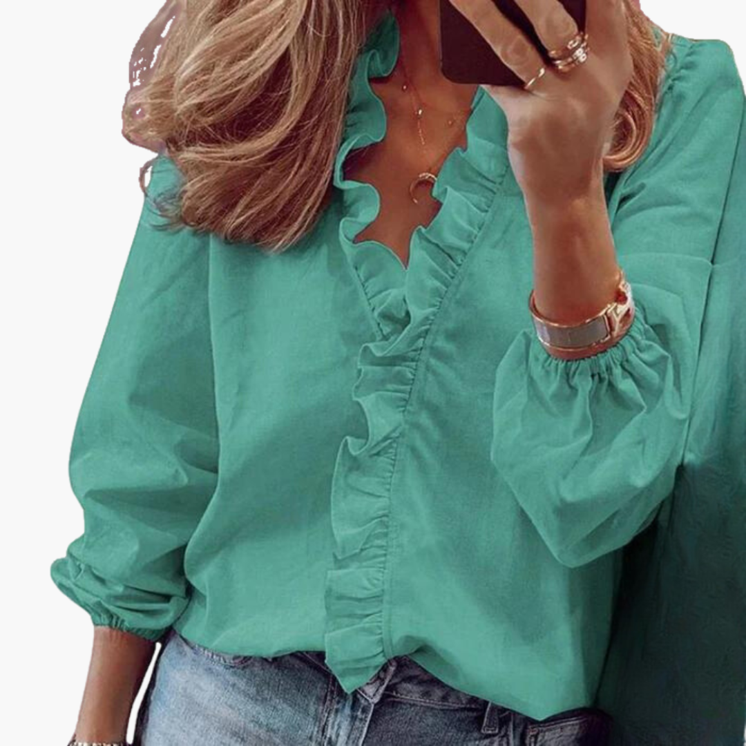 V-ringad blus med volanger