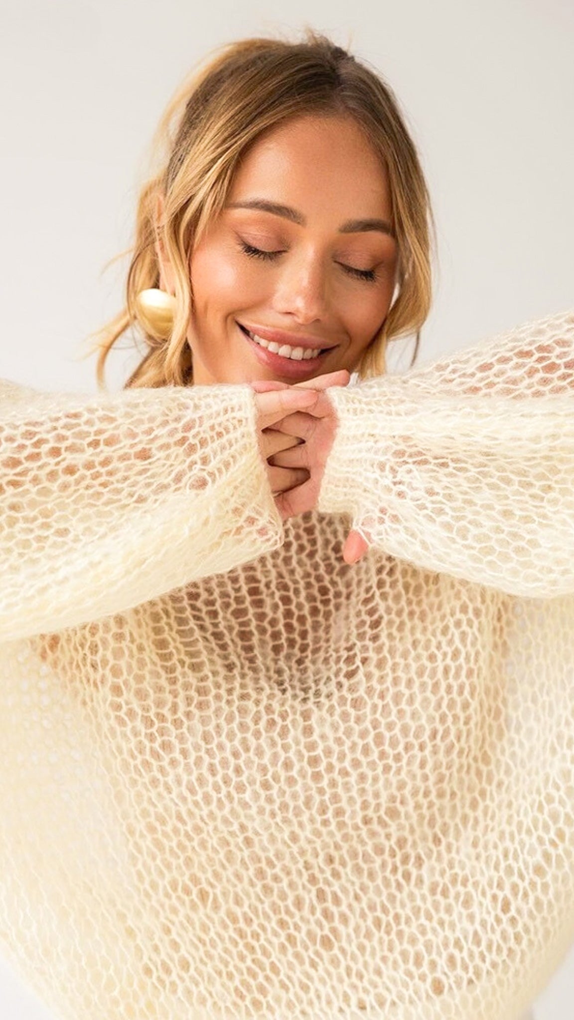 Aurelia – Stickad tröja i mesh med stil