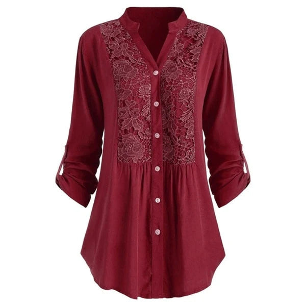 Astrid – Elegant blus med puffärmar och läckra spetsdetaljer
