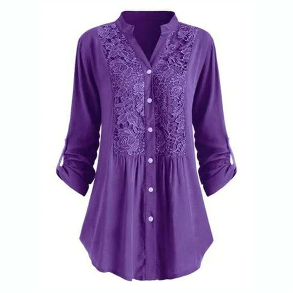 Astrid – Elegant blus med puffärmar och läckra spetsdetaljer