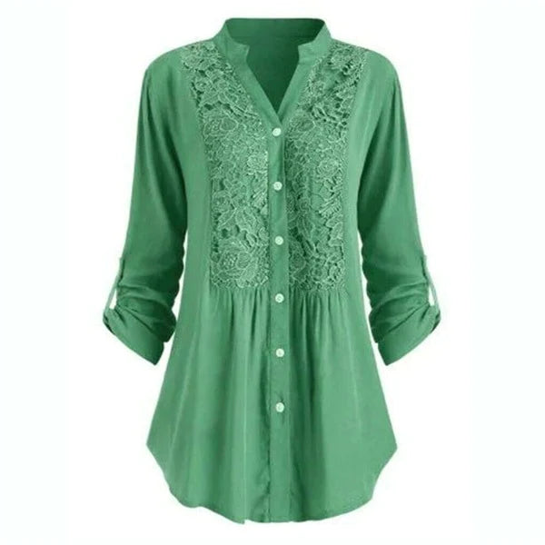 Astrid – Elegant blus med puffärmar och läckra spetsdetaljer