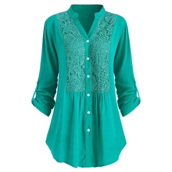 Astrid – Elegant blus med puffärmar och läckra spetsdetaljer
