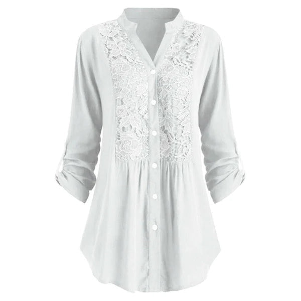 Astrid – Elegant blus med puffärmar och läckra spetsdetaljer