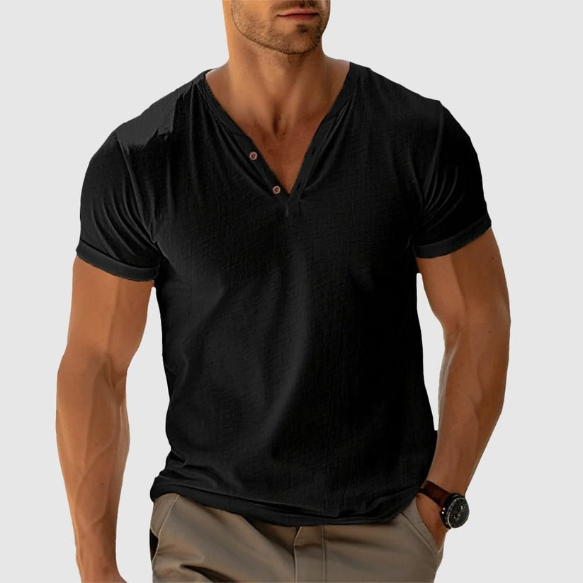 Stilren stickad t-shirt med knappdetaljer