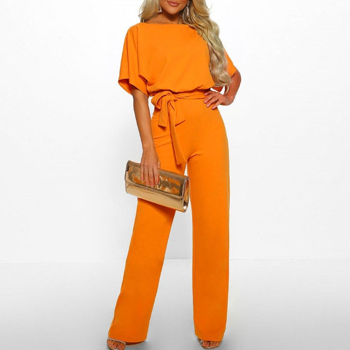 Kortärmad jumpsuit med bälte för dam