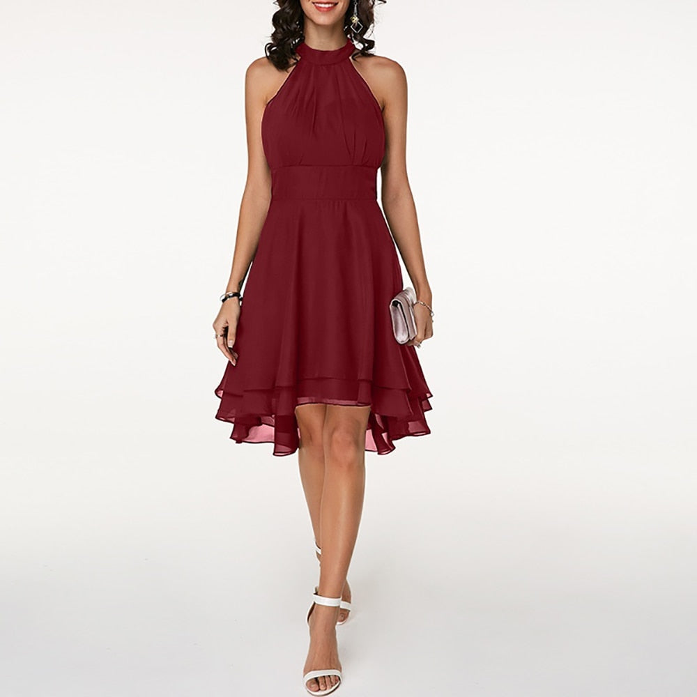 Stilrent Midi-Klänning med Halterneck och Elegant Fall