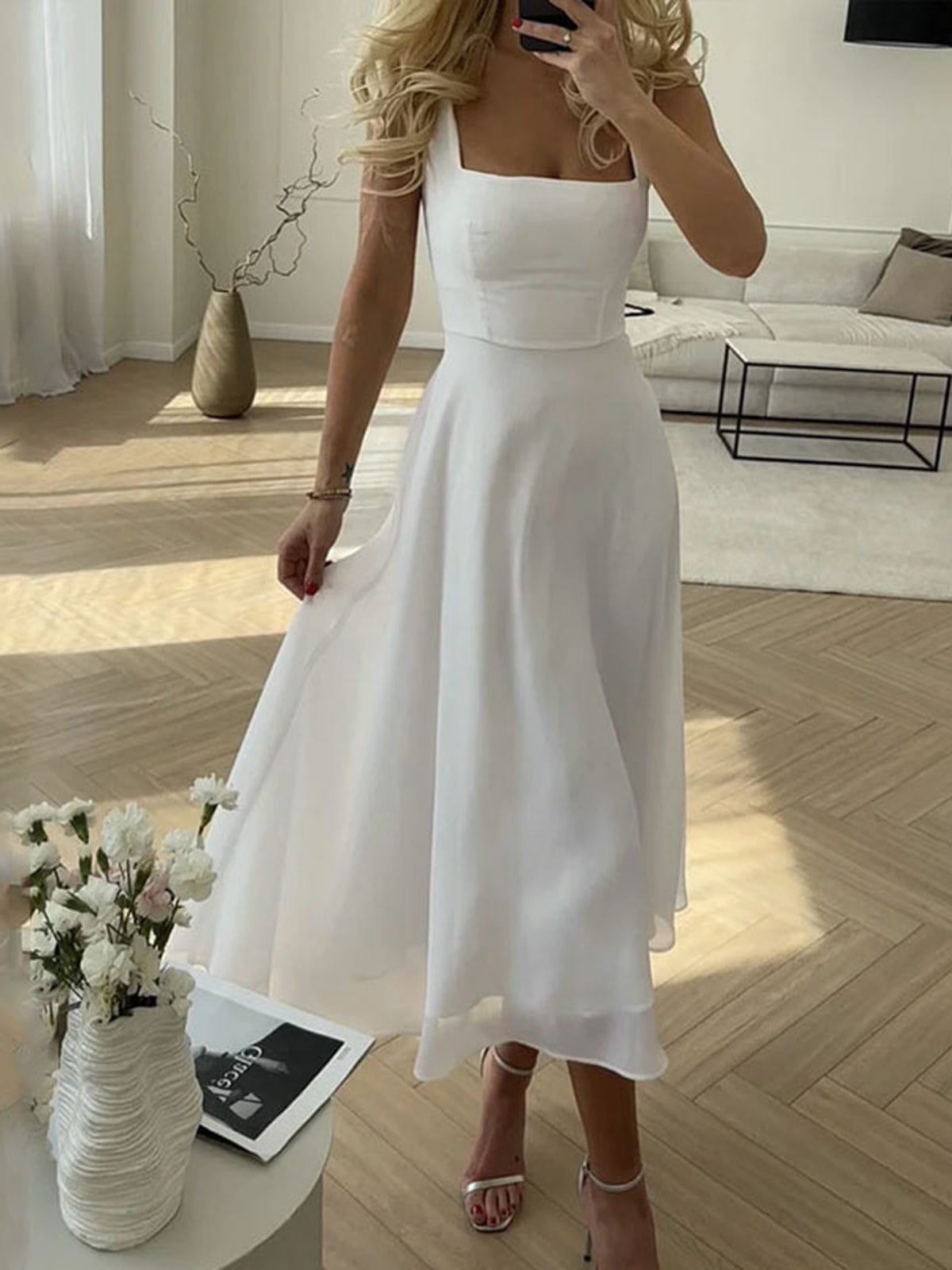 Eleganta Midi-Klänningen med Smickrande Silhuett
