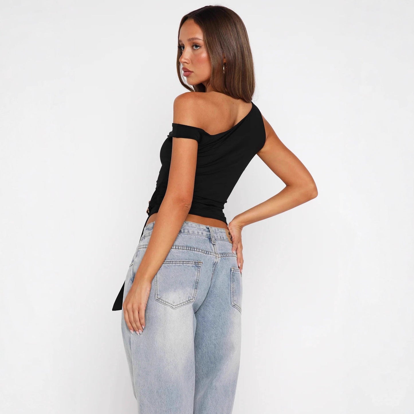 Asymmetrisk topp med chic bälte för moderna kvinnor