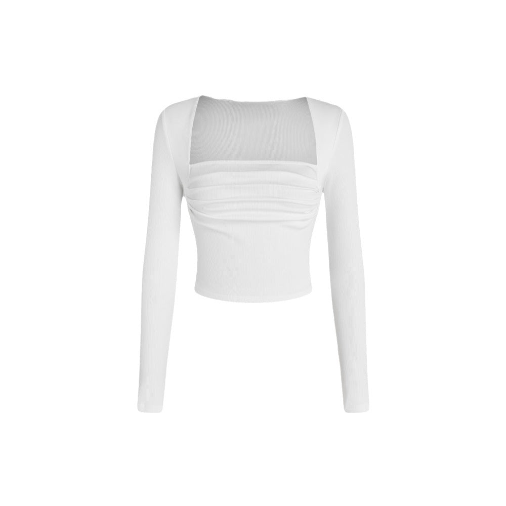 Stilfuld cropped langærmet bluse med elegant drapering