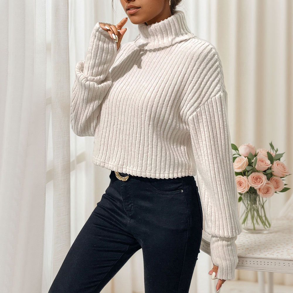Moderne cropped trøje med høj krave og elegant struktur