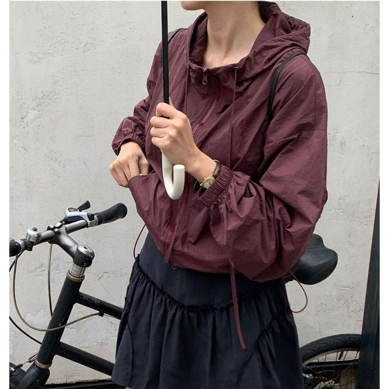 Moderne cropped sportjakke med justerbar snøre
