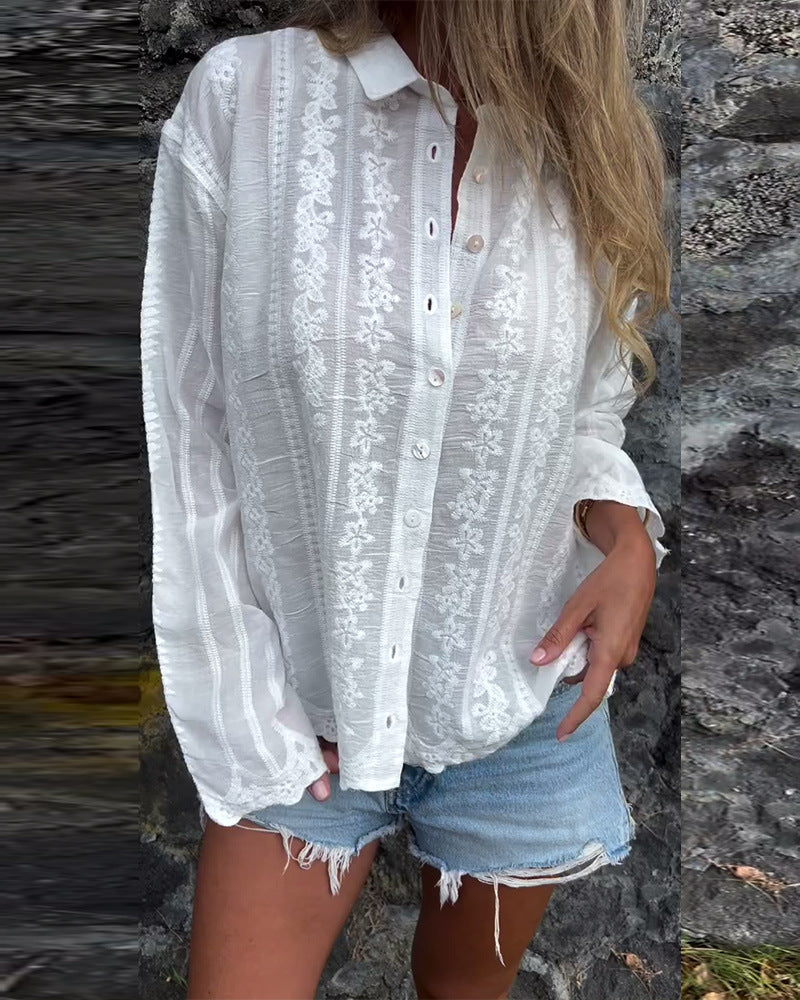 Elegant Bluse med Blomsterbroderi og Struktureret Design