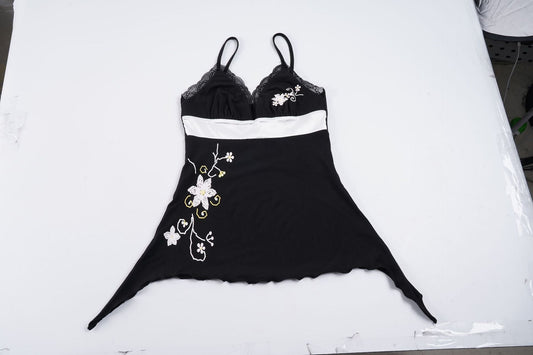Elegant badmode med blommigt mönster och justerbara band
