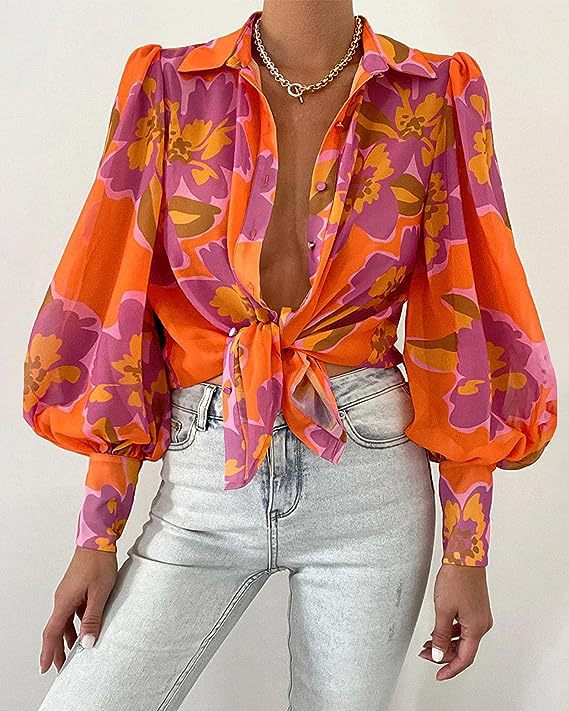 Elegant blus med djurtryck och lös silhuett