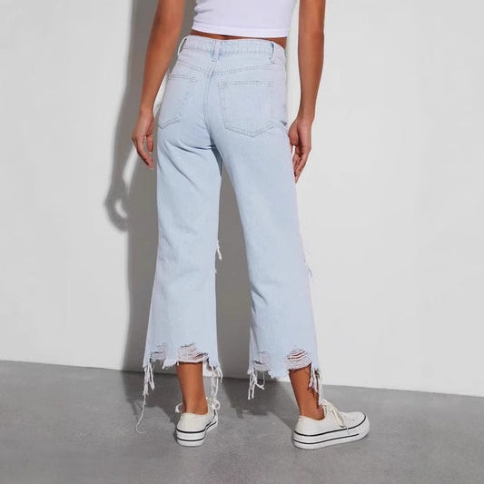 Urban Chic Jeans med Löst Slitna Detaljer och Oemotståndlig Stil