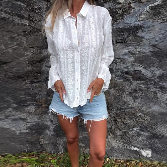 Elegant Bluse med Blomsterbroderi og Struktureret Design