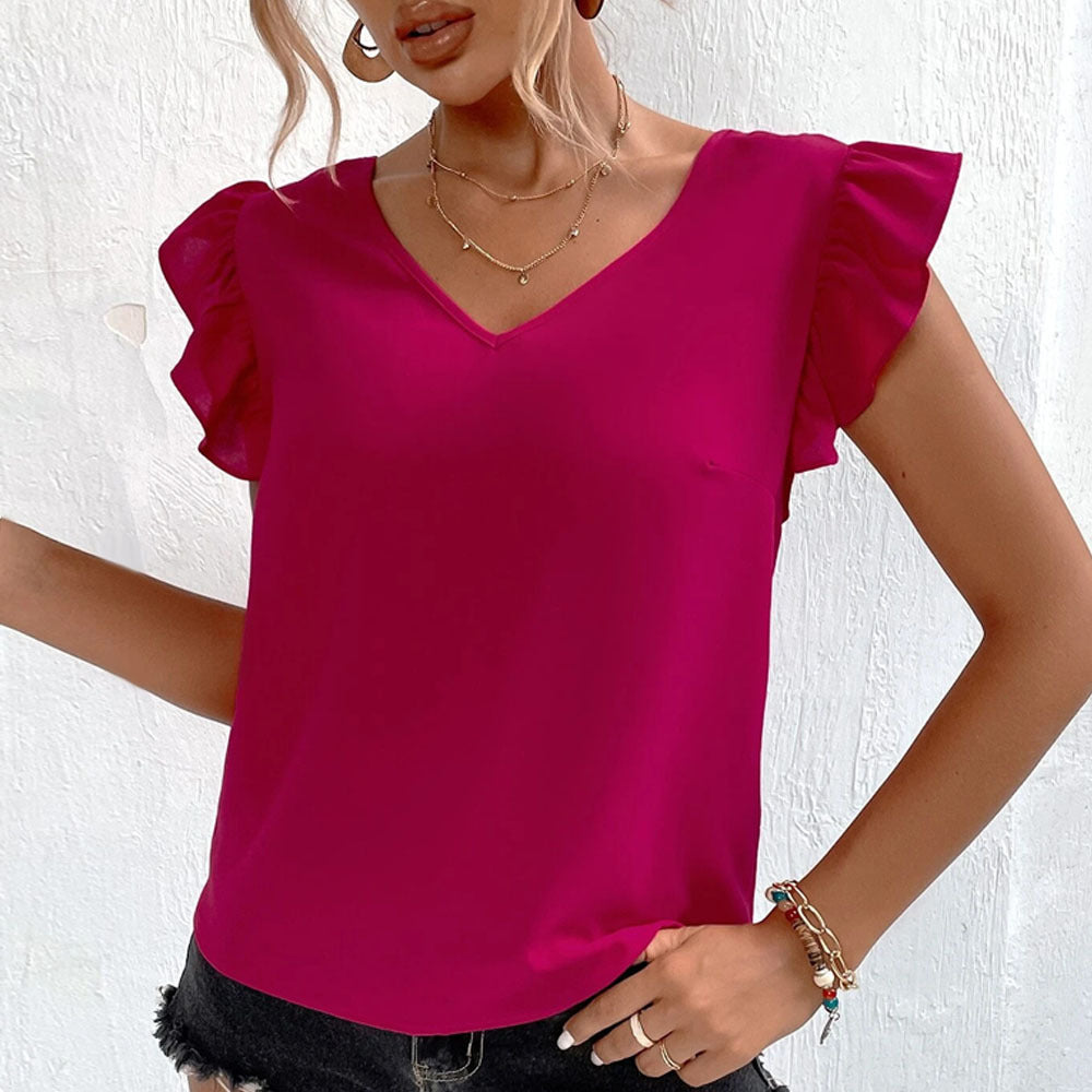 Elegant Blus med Voluminösa Detaljer och Feminin V-ringning