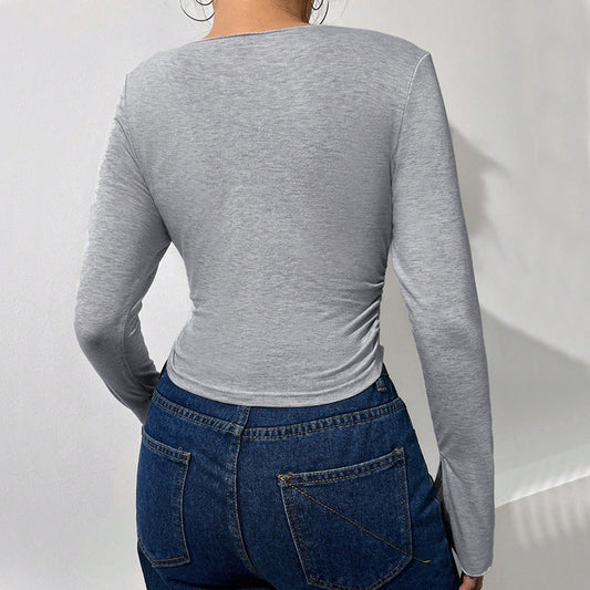 Elegant Cropped Långärmad Blus med Trumpetärm och V-ringning