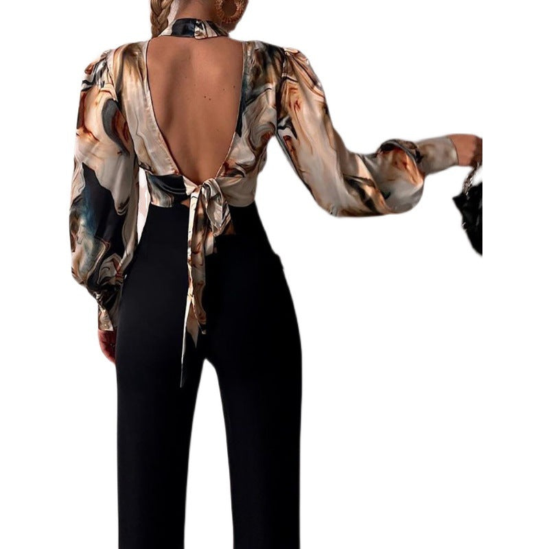 Chic blus med nyckelhålsdetalj och voluminösa ärmar