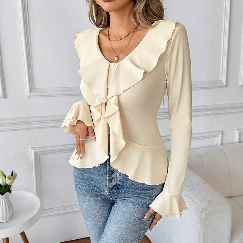 Feminin Blus med Rynkade Detaljer och Elegant Silhuett