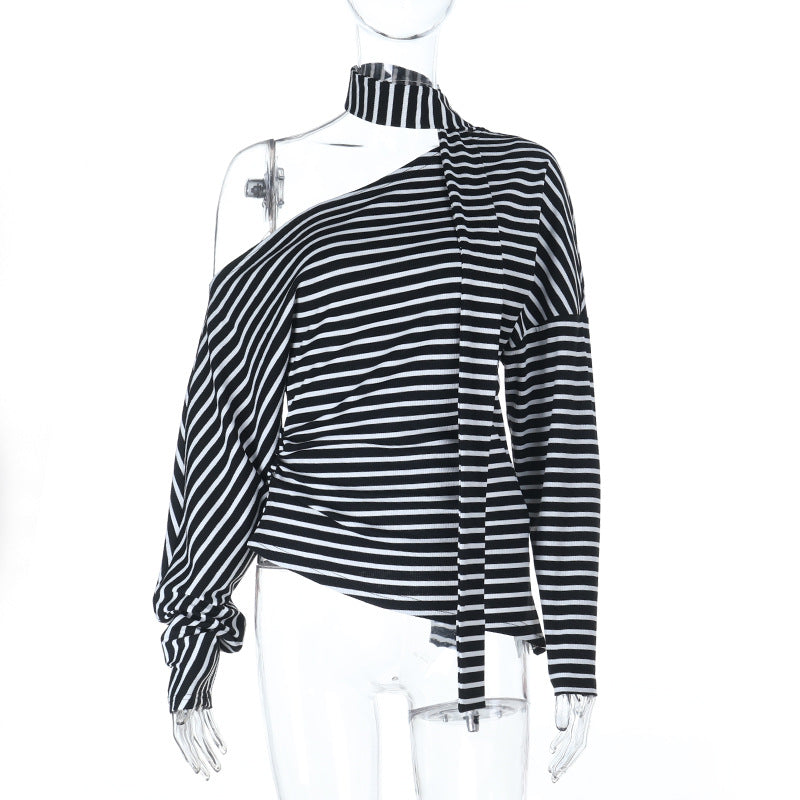Asymmetrisk blus med axelbar design och stilfull knut