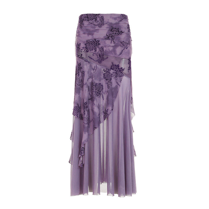 Sofistikerad asymmetrisk maxikjol med blommiga detaljer