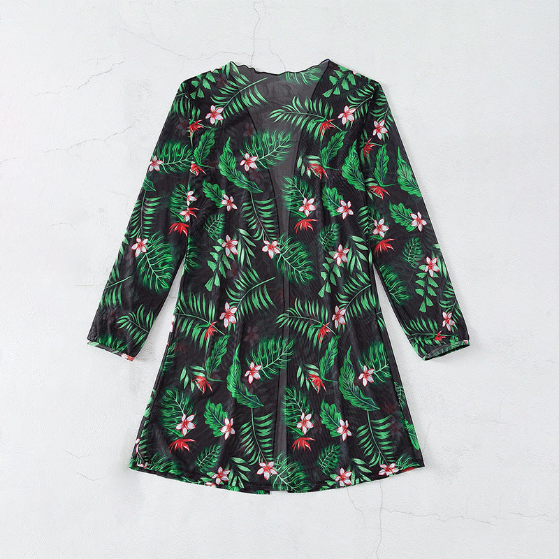 Elegant Baddräkt med Blommig Kaftan och Högskuren Trosa