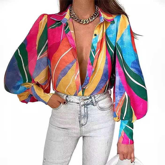 Elegant blus med djurtryck och lös silhuett