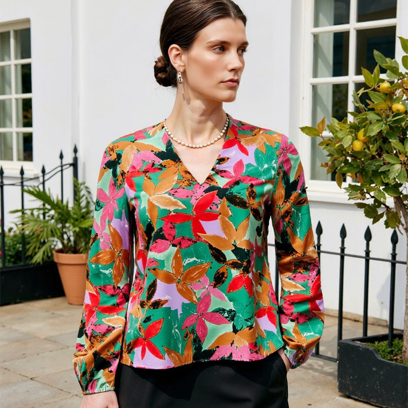 Elegant Bluse med Blomsterprint og Lækkert Draperet Stof