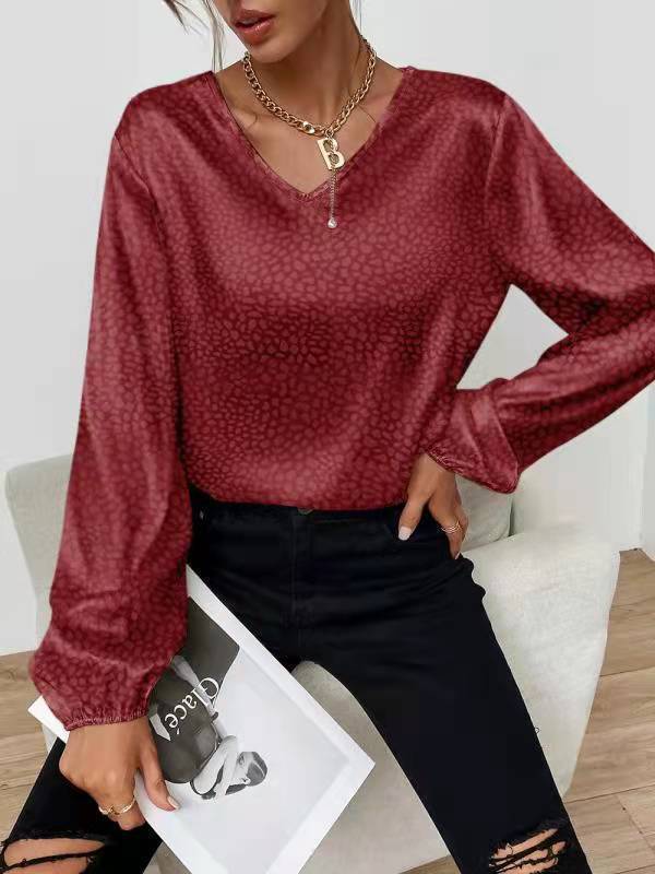 Moderne Bluse med V-Udskæring og Unikt Design