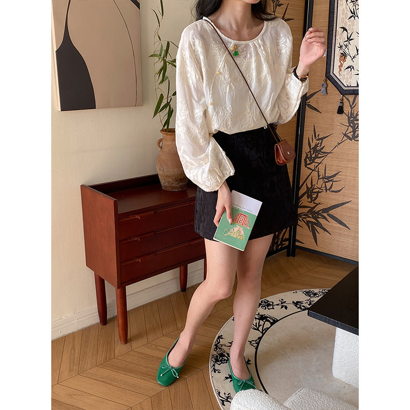 Feminine Bluse med Puffærmer og Elegant Design