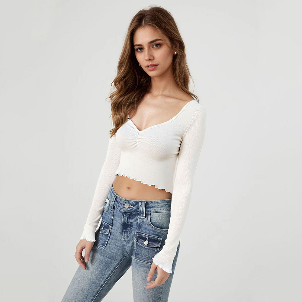 Elegante cropped langærmet top med rynkede detaljer