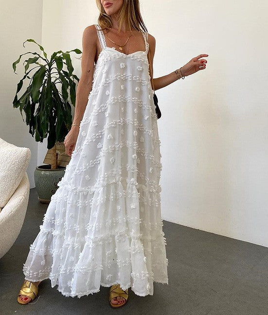 Elegant sommerkjole med volanger og blomsterprint