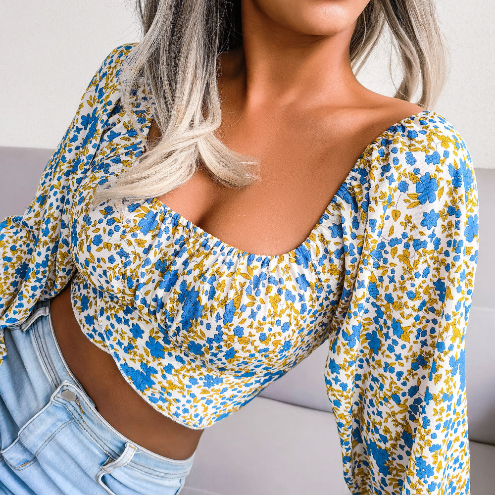Feminine Bluse med Blomsterprint og Pufærmer