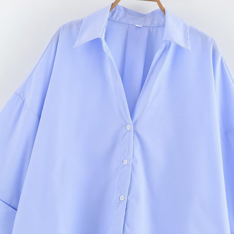 Elegant Bluse med Løs Silhuet og Chic Ærmer