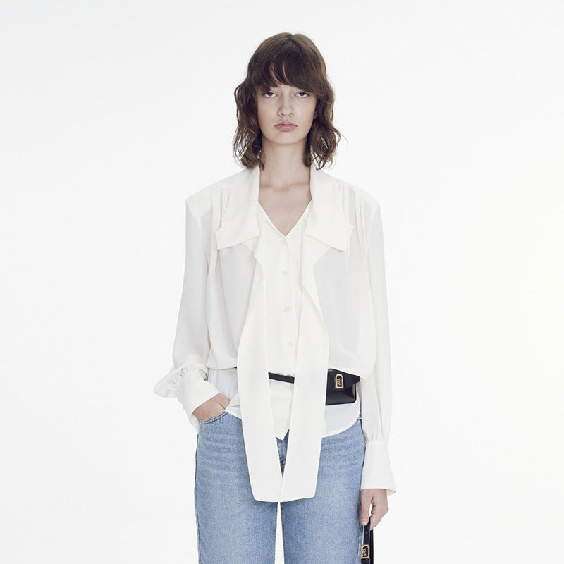Feminine Bluse med Sløjfe og Trendy Detaljer