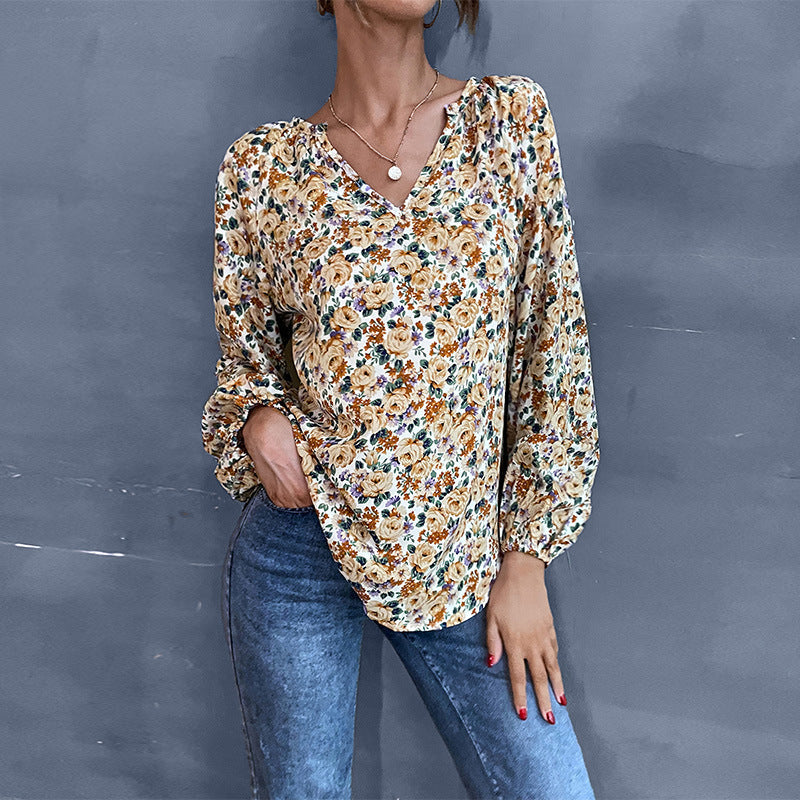Feminine Bluse med Blomsterprint og Elegant Rynkning