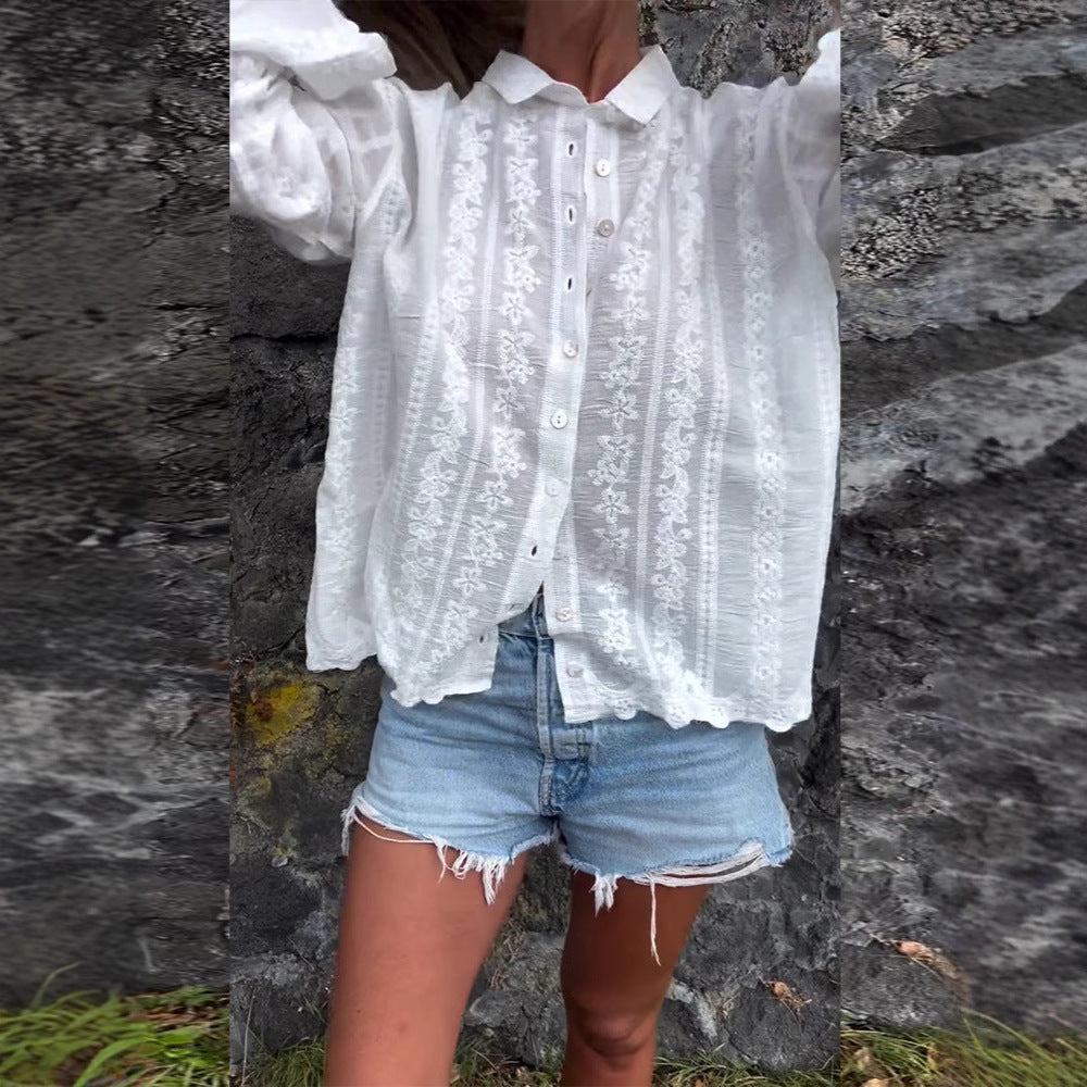 Elegant Bluse med Blomsterbroderi og Struktureret Design