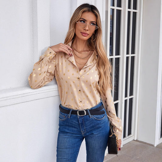 Sofistikerad Blus med Glittrande Design och Modernt Snitt