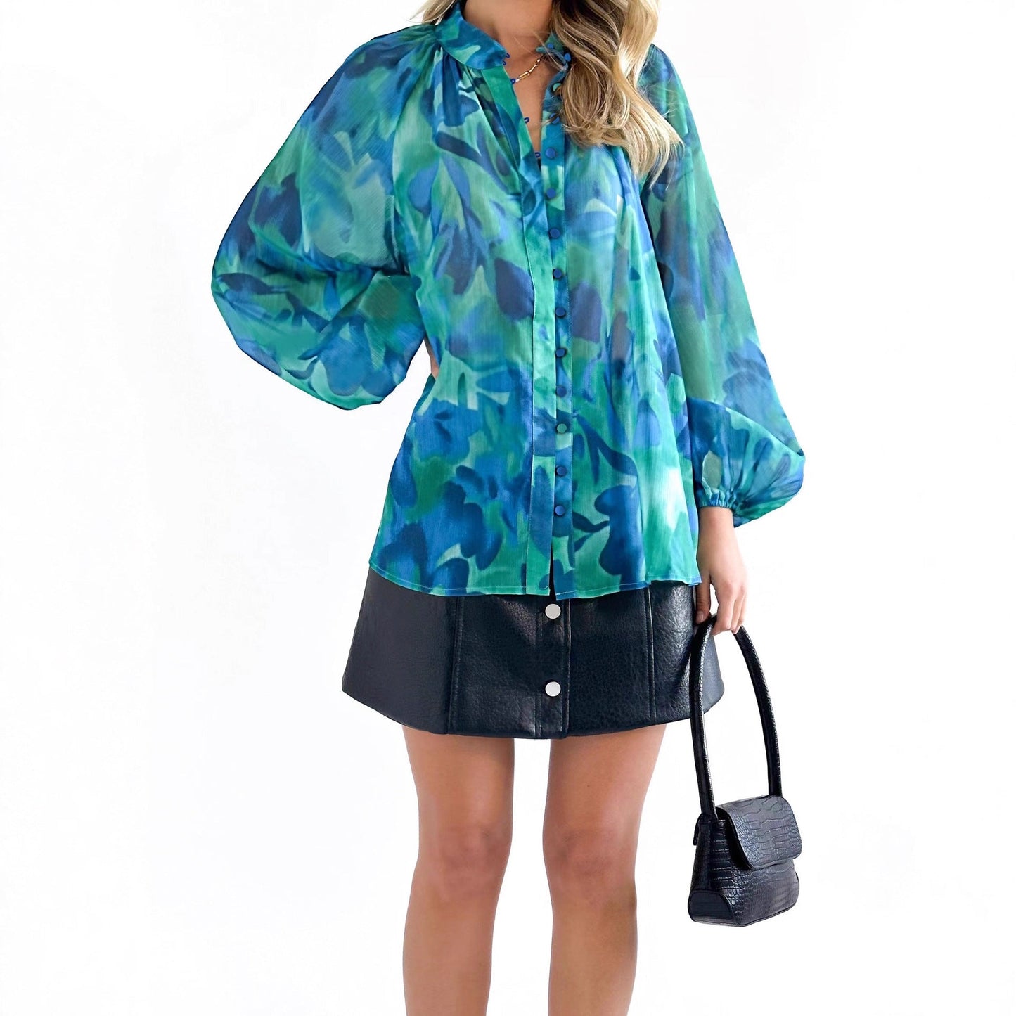 Feminint Bluse med Luftige Puffærmer og Elegant Snit