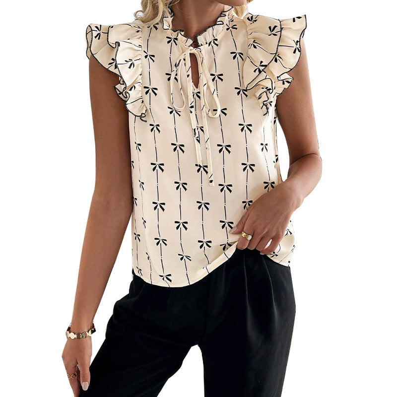 Elegant blus med smickrande detaljer och blomstertryck
