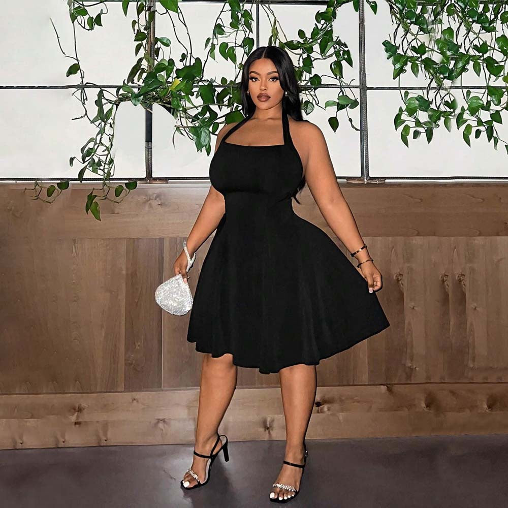 Elegant Off-Shoulder Klänning med Flödande Kjol