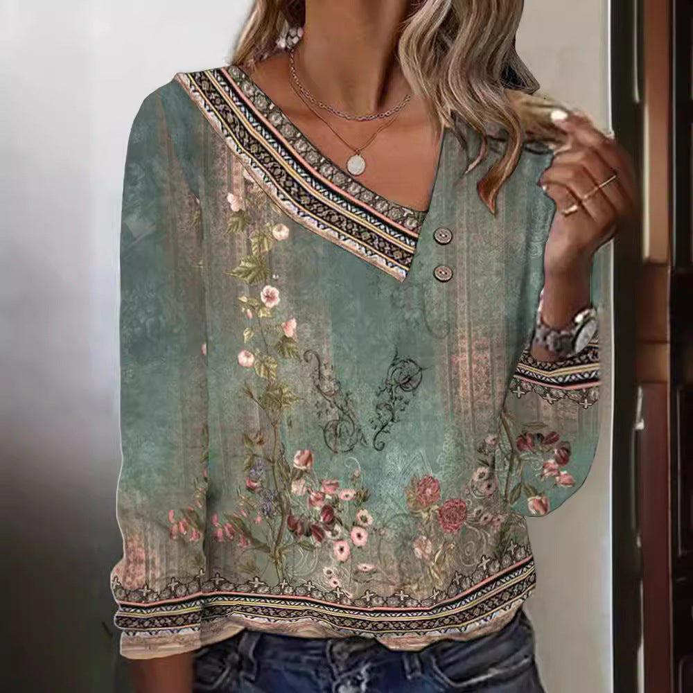 Blommig blus med V-ringning och eleganta detaljer