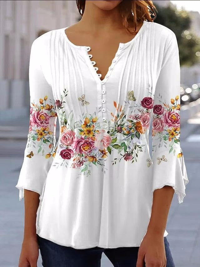 Elegant Blus med Blommigt Tryck och Knappsymfoni