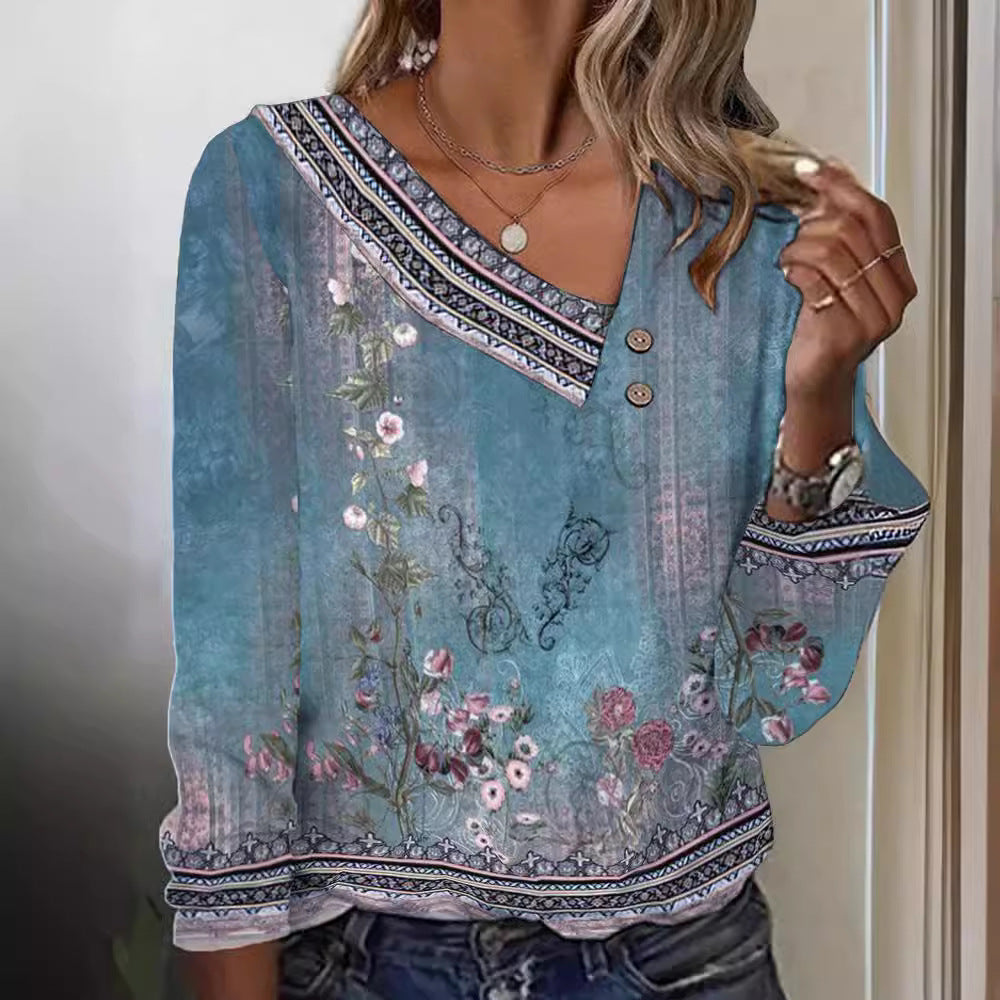 Blommig blus med V-ringning och eleganta detaljer