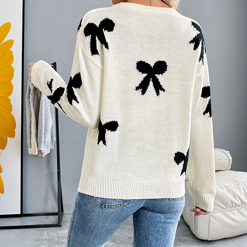Feminint Strikket Pullover med Legende Sløjfedetaljer